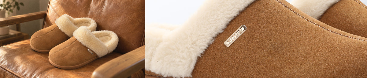 A pair of tan suede slip-on slippers with white sherpa lining, shown resting on a brown leather chair in a lifestyle setting, alongside a close-up detail of the slippers showing the brand tag 'PCSsole'.