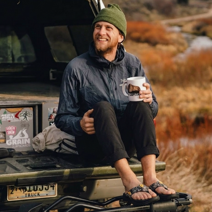 The man was wearing black camo arch support flip flops